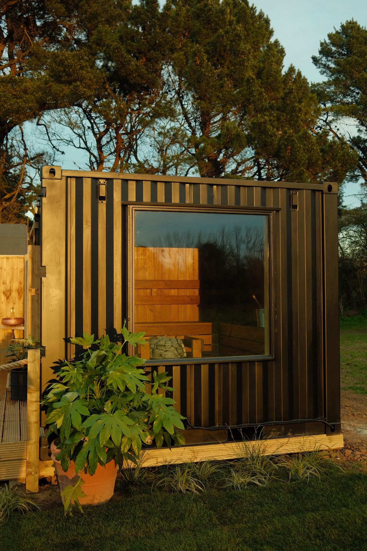 Exterior of the Sauna with the evening sun on it